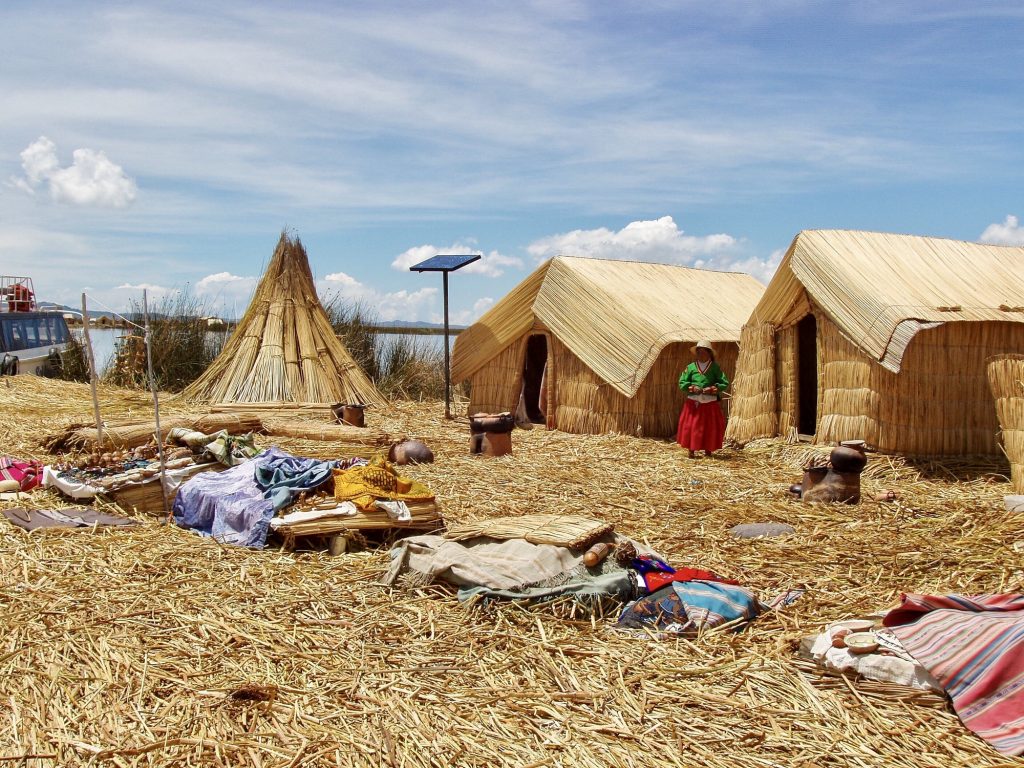 Inhabited floating islands and homes made of reeds on Lake Titicaca in Peru.