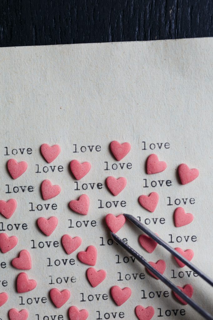 Heart shaped candy with loving words